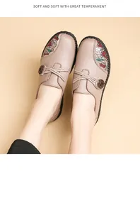 Close-up of comfortable women's leather loafers with floral embroidery detail