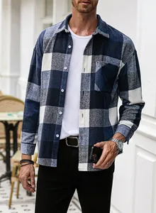 Men's classic navy blue plaid flannel shirt shown in a relaxed outdoor casual street setting