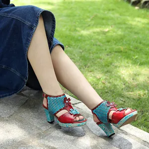 Model wearing vintage handmade leather sandals with color-block floral design