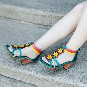 Vintage leather high heel sandals with woven straps and colorful floral details for summer