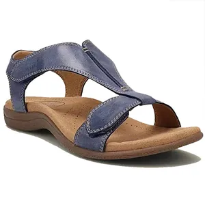 Gedetailleerd zijaanzicht van blauwe dames platte T-band sandalen met klittenband.