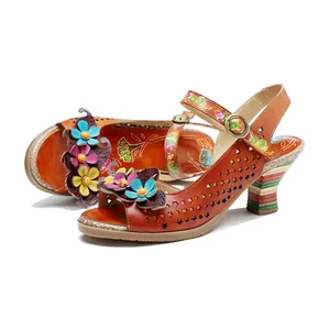 Handmade genuine leather sandals with hollow star patterns and colorful 3D floral details.
