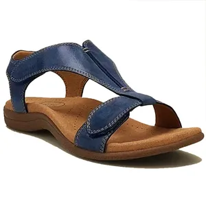 Comfortabele blauwe platte leren damessandalen met verstelbaar klittenband T-strap model