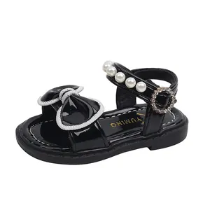 Sandalias de princesa negras para niña con lazo y perlas, suela blanda de verano.