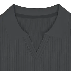 Close-up of charcoal grey men's polo shirt with ribbed texture and V-neckline detail
