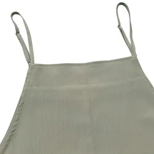 Detail view of adjustable camisole straps and crinkled ice silk fabric texture