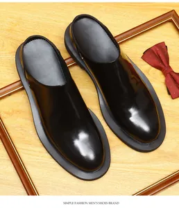 Detail view of black shiny leather mules for men with thick sole and elegant British style
