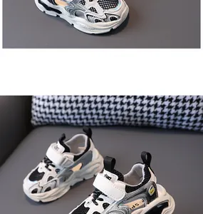 Detailed view of breathable hollow children's sneakers with black and white sporty design