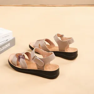 Side view of comfortable genuine leather wedge sandals for women with non-slip soft soles