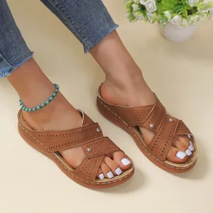 Wedge platform sandals for women featuring hollow-out cross straps and stitching