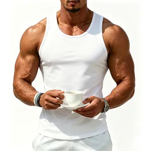 Close-up of a muscular man wearing a white cotton tank top holding a coffee cup