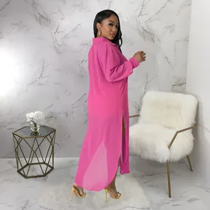 Camisa larga de gasa rosa fucsia transparente con aberturas laterales