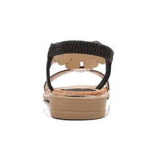 Bohemian black rhinestone flat sandals with elastic back strap and cutout design