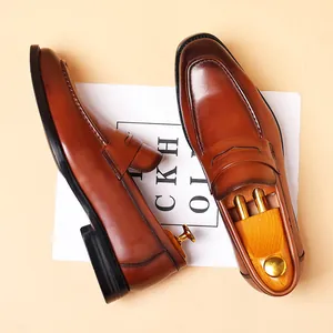 Classic brown leather penny loafers for men with British style for business casual wear