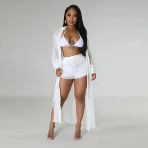 Conjunto de playa sexy de tres piezas blanco con cárdigan largo de gasa y bikini