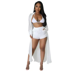 Conjunto de playa sexy de 3 piezas de gasa blanca con cárdigan largo y pantalones.