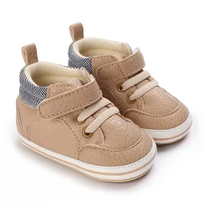 Toddler high-top walking shoes featuring tan faux leather and striped collar for 0-1 years