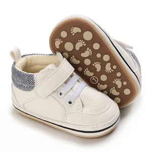 High-top baby walking shoes with durable rubber sole and non-slip footprint pattern