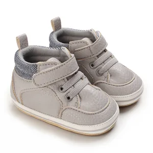High-top grey baby pre-walker shoes featuring soft rubber soles and velcro straps for 0-1 year olds