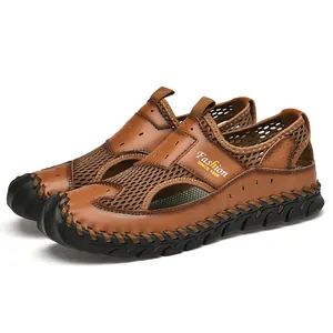 Breathable brown mesh and leather outdoor men's sandals featuring durable handmade stitched soles