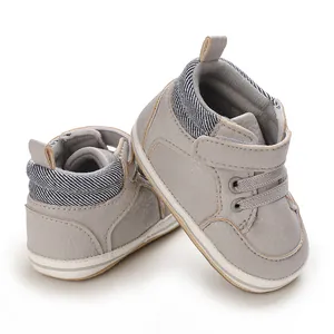 Detail of grey high-top baby walker shoes with anti-slip rubber sole for infants aged 0-1