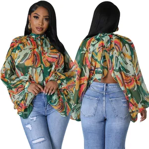 Elegante blusa in chiffon a fiori con maniche a pipistrello e dettaglio fiocco sul retro