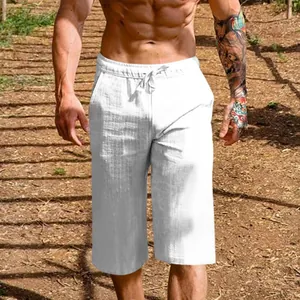 Close-up of white breathable linen-cotton 3/4 shorts for men showing fabric texture