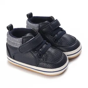 Navy blue baby high-top sneakers with durable rubber soles and velcro straps for infants
