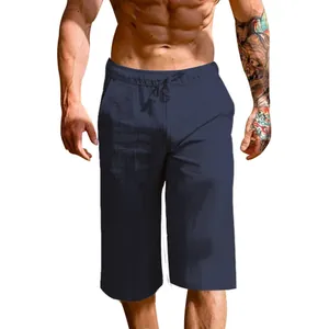 Close-up view of the waist and texture of navy blue linen cotton cropped pants for men