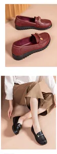Close-up of burgundy and black perforated loafers for women, showing breathable detail