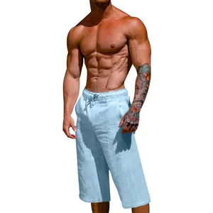 Detail view of men's breathable light blue linen cropped pants on model