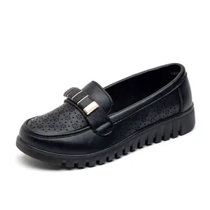 Women's breathable black leather loafers featuring hollow floral cutouts and soft comfortable sole