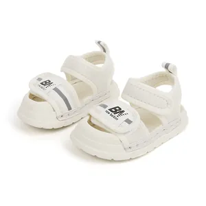 Classic white toddler walking sandals with anti-collision design and velcro straps
