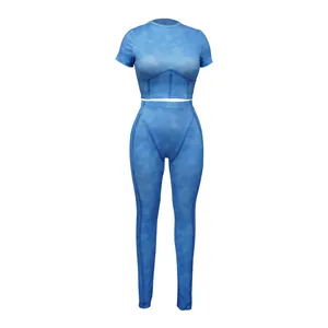 Front view of blue ribbed two-piece sports set with cropped top and high-waist leggings