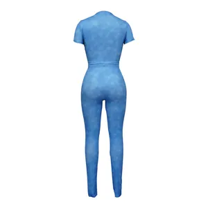 Back view of a blue ribbed two-piece bodycon sports set for women