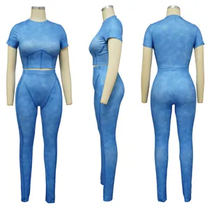 Detailed front side and back views of a blue ribbed two-piece sports set on a mannequin