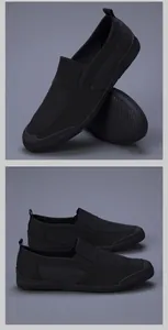 Detailansicht des atmungsaktiven Mesh-Materials schwarzer Herren-Freizeitschuhe