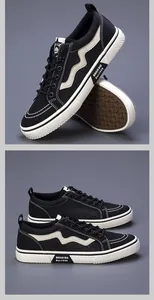 Vista dettagliata delle sneakers da uomo in mesh nero traspirante con accenti ondulati bianchi