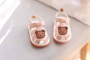 Pink baby sandals with cute cartoon bear and soft non-slip soles for toddlers