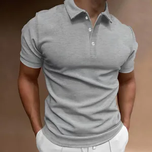 Macro view of grey men's slim fit polo shirt featuring three buttons and fabric texture