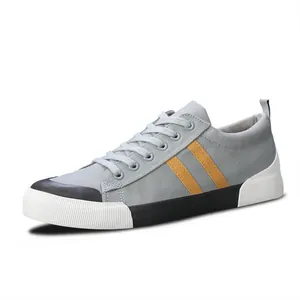 Ανδρικά γκρι πάνινα sneakers με κομψές κίτρινες ρίγες και σχέδιο με κορδόνια άνετο