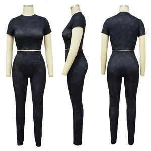 Detailed front, side and back views of ribbed sports two-piece set with leggings
