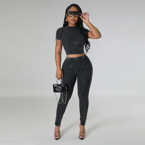 Macro detail of sexy 2-piece ribbed knit outfit with crop top and leggings for women