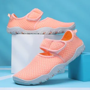 Breathable orange mesh water shoes with non-slip soft rubber soles for beach