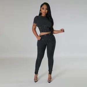 Professional studio shot of a sexy ribbed two-piece set with crop top and leggings