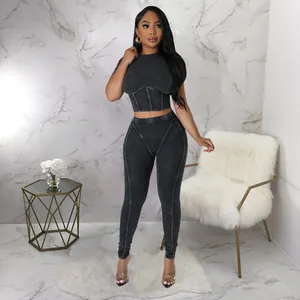 Full view of two-piece ribbed sportswear set with slim-fit leggings and crop top