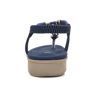 Rear view of comfortable navy blue bohemian wedge sandals for women with elastic strap