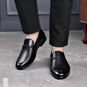 Elegant black genuine leather loafers for men with stylish metal buckle detail design