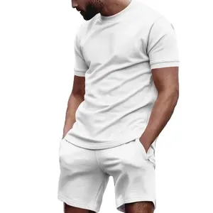 Detail of men's plain white casual T-shirt and shorts sports set in a soft cotton