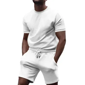 Close-up of a white minimalist sports casual t-shirt and shorts two-piece set for men
